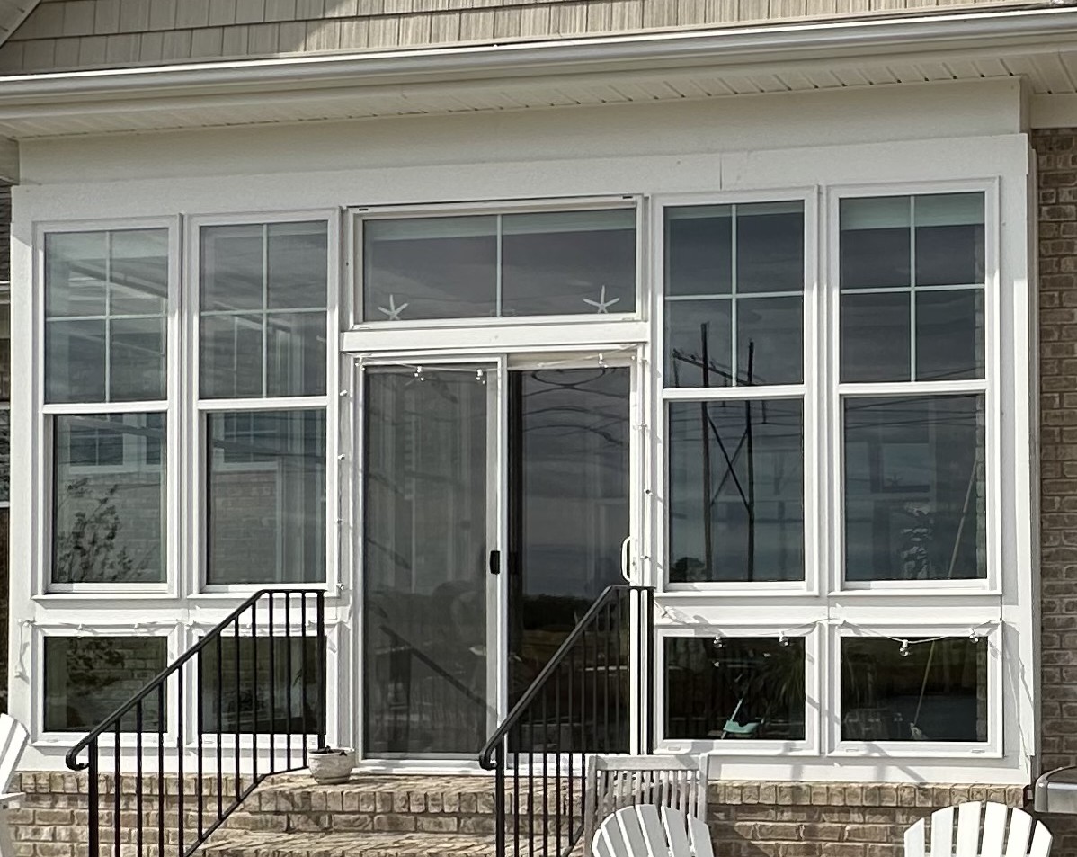 Sunlit clean windows on a Wilmington coastal home